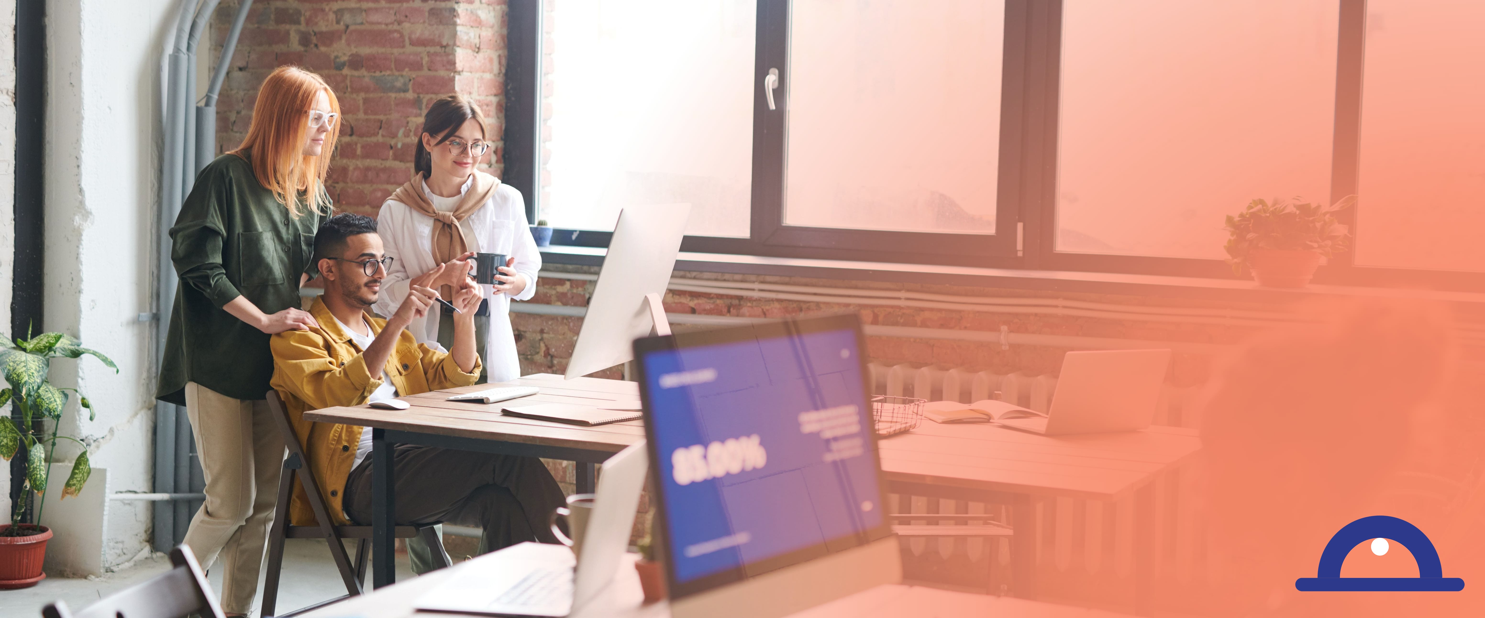 A team reviewing a leave dashboard on screen instead of a spreadsheet